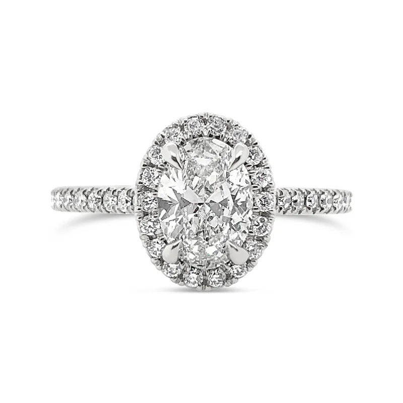 Platinum Oval Shape Diamond Halo Engagement Ring